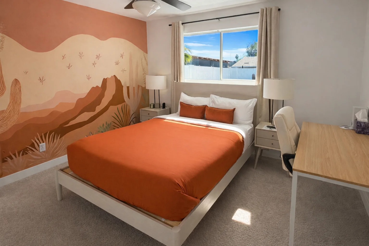 Orange desert mural guest bedroom at El Charro Sol